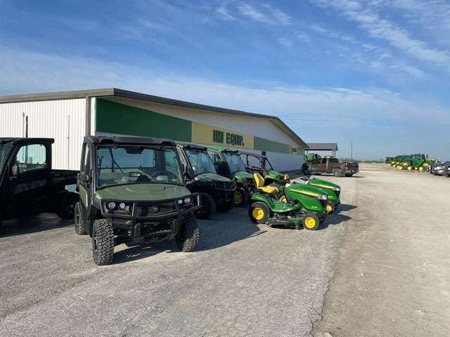 IMI Equipment LLC vehicles in front of building